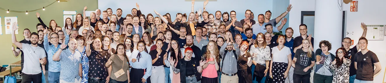 A group photo of Seibert employees chanting.